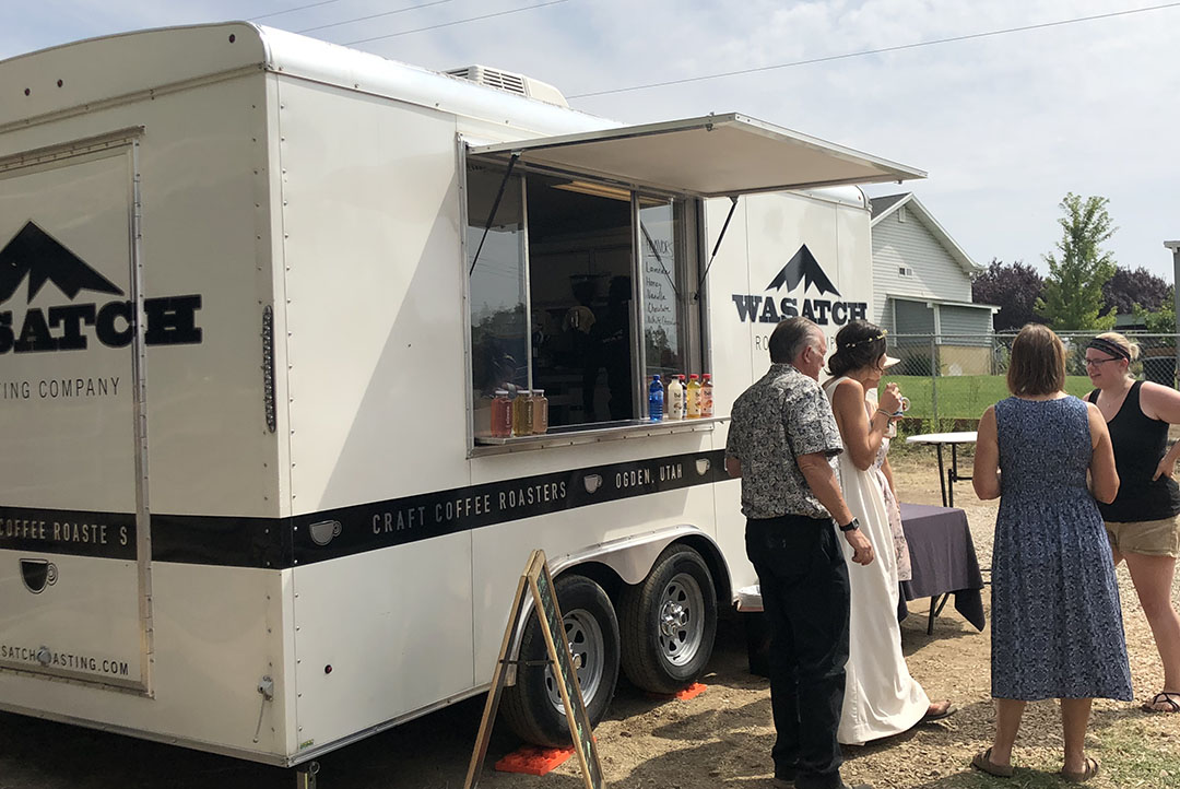 A photo of the Wasatch Roasting trailer at an event